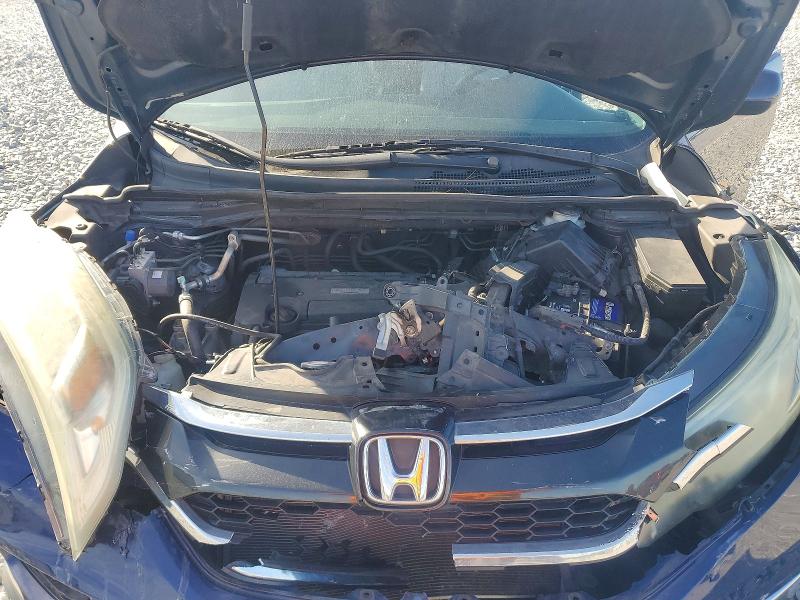 Photo 11 from auction – 2016 HONDA CR-V EX with VIN 2HKRM3H53GH566440
