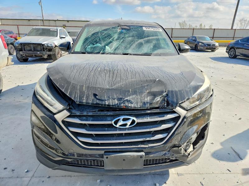 Photo 5 from auction – 2016 HYUNDAI TUCSON SE with VIN KM8J23A48GU165326