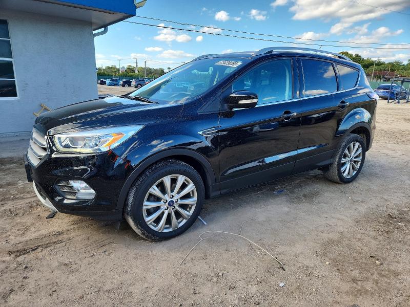 FORD ESCAPE TIT 2017 with VIN 1FMCU0JD9HUE44836 - Photo from auction