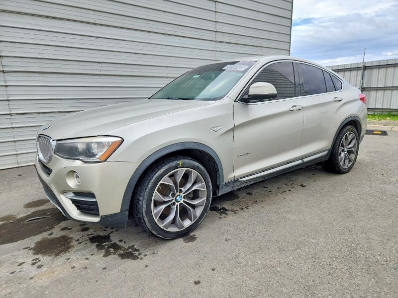 BMW X4 XDRIVE2 2015 with VIN 5UXXW3C56F0M86570 - Photo from auction