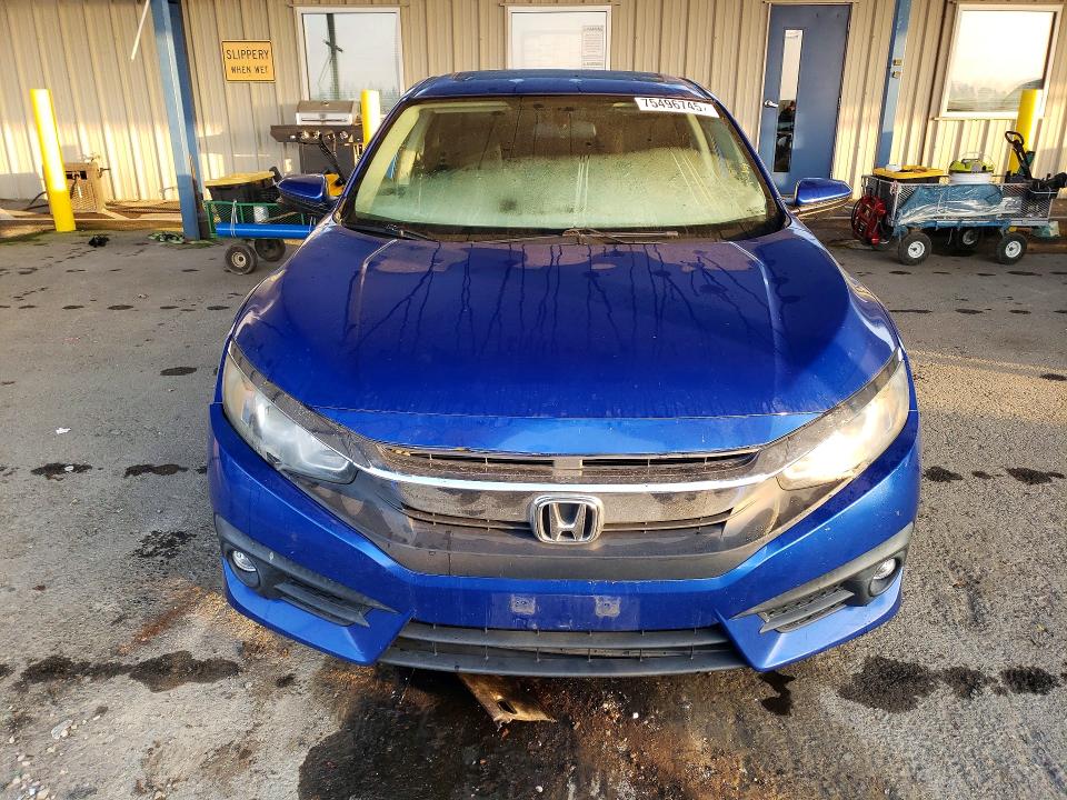 Photo 5 from auction – 2018 HONDA CIVIC with VIN 19XFC1F32JE200332