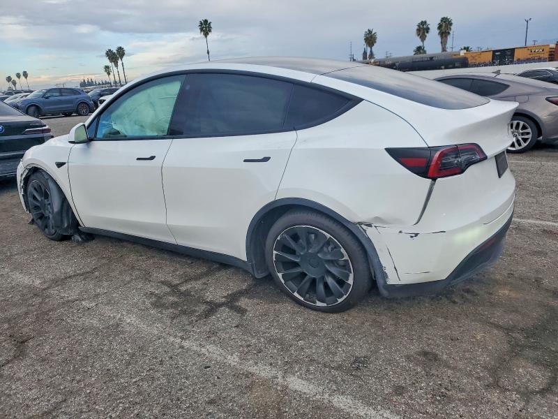 Photo 2 from auction – 2021 TESLA MODEL Y with VIN 5YJYGDED4MF114995
