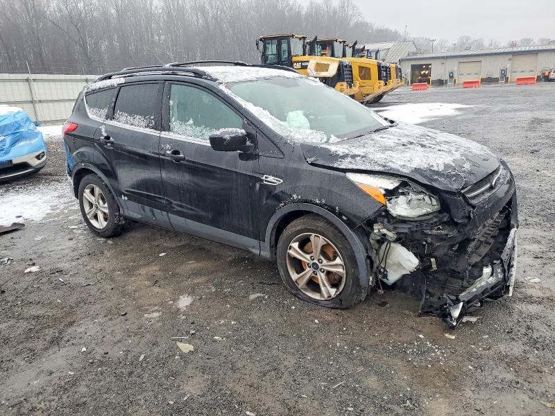 Photo 4 from auction – 2016 FORD ESCAPE SE with VIN 1FMCU9GX7GUB42482