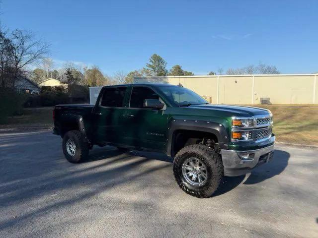 CHEVROLET SILVERADO 2015 with VIN 3GCUKREC0FG341521 - Photo from auction