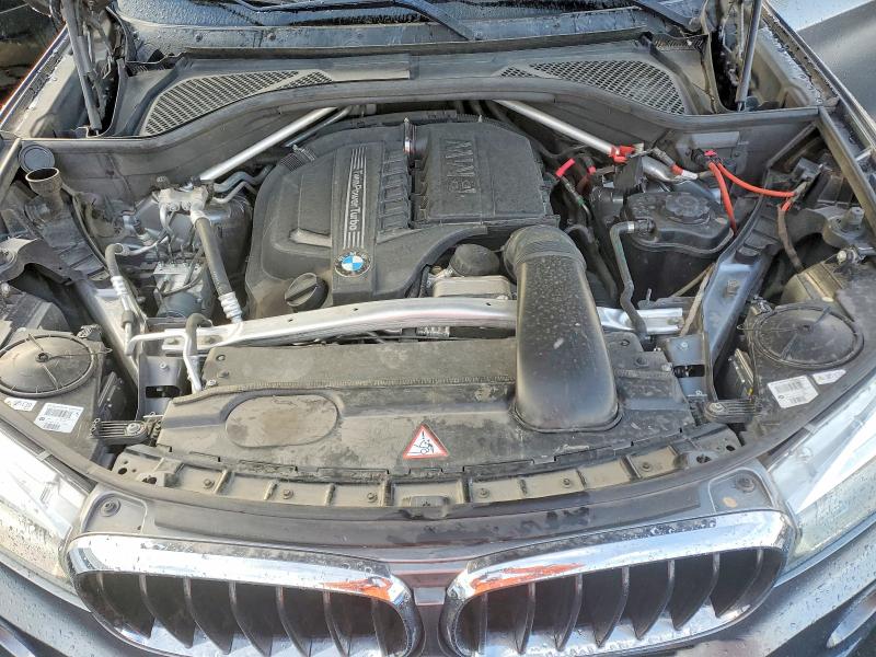 Photo 11 from auction – 2014 BMW X5 SDRIVE3 with VIN 5UXKR2C56E0H32255