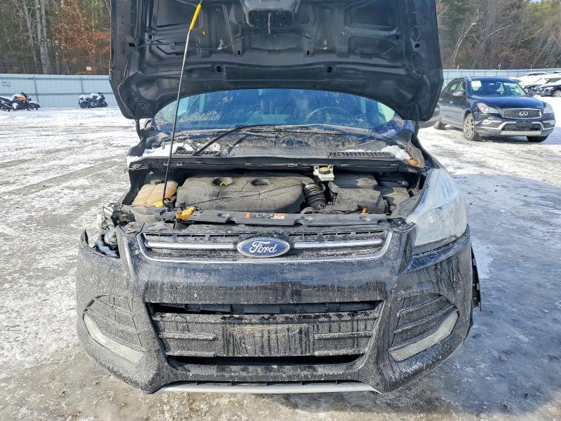 Photo 12 from auction – 2015 FORD ESCAPE TIT with VIN 1FMCU9J90FUC14826