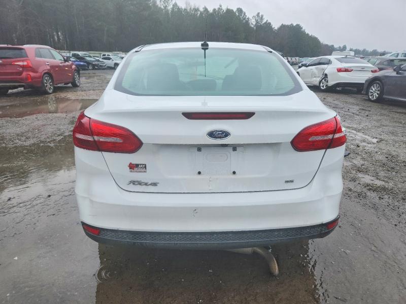 Photo 6 from auction – 2018 FORD FOCUS SE with VIN 1FADP3F21JL224004
