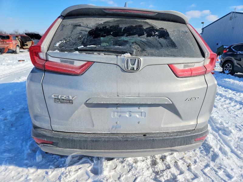 Photo 6 from auction – 2018 HONDA CR-V EX with VIN 7FARW2H58JE030100