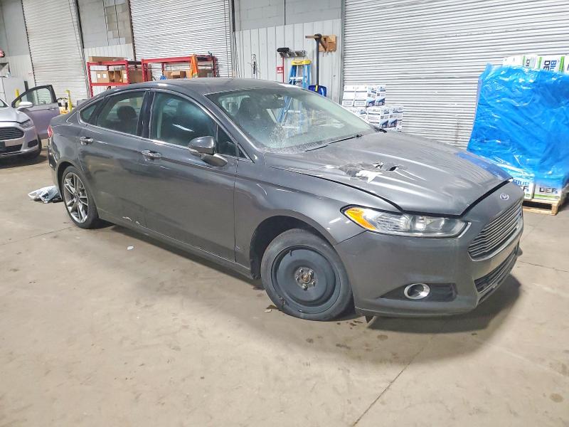 Photo 4 from auction – 2016 FORD FUSION TIT with VIN 3FA6P0K98GR235506