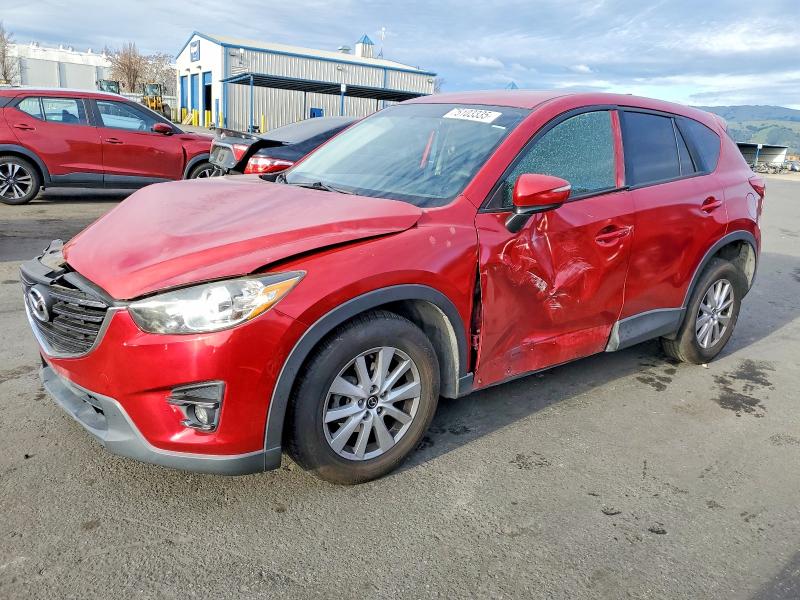MAZDA CX-5 TOURI 2016 with VIN JM3KE2CY4G0628362 - Photo from auction