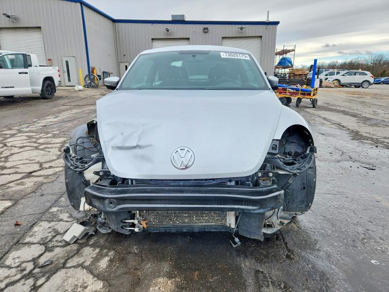Photo 5 from auction – 2014 VOLKSWAGEN BEETLE with VIN 3VWJX7AT5EM631393