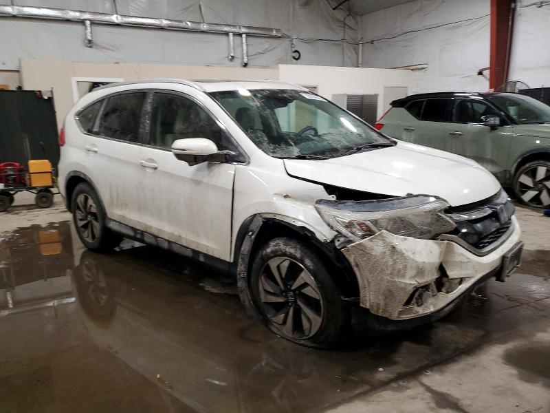 Photo 4 from auction – 2015 HONDA CR-V TOURI with VIN 5J6RM4H97FL080193