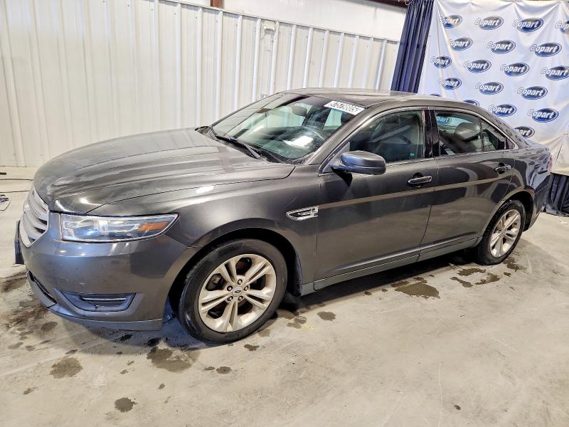 FORD TAURUS 2016 with VIN 1FAHP2E80GG152988 - Photo from auction