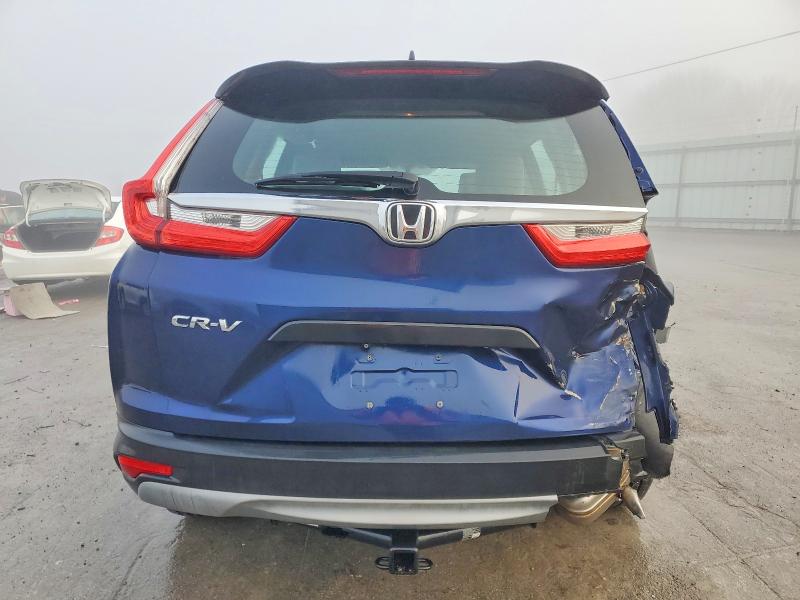 Photo 6 from auction – 2017 HONDA CR-V LX with VIN 7FARW5H36HE008798