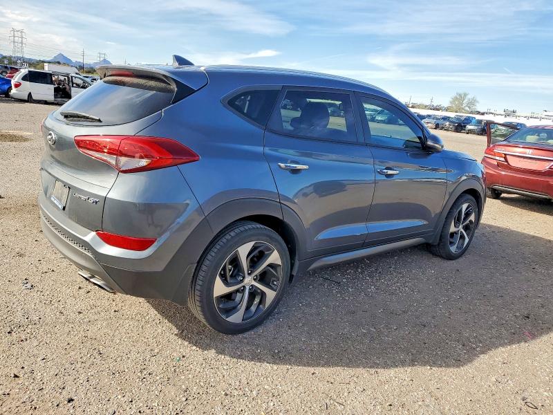 Photo 3 from auction – 2016 HYUNDAI TUCSON LIM with VIN KM8J33A24GU250319