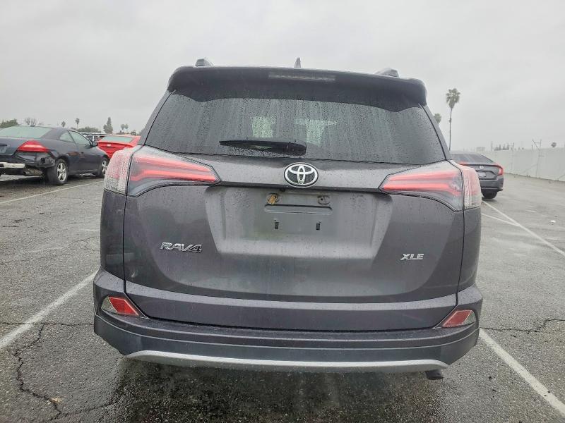 Photo 6 from auction – 2016 TOYOTA RAV4 XLE with VIN JTMWFREV2GJ072632