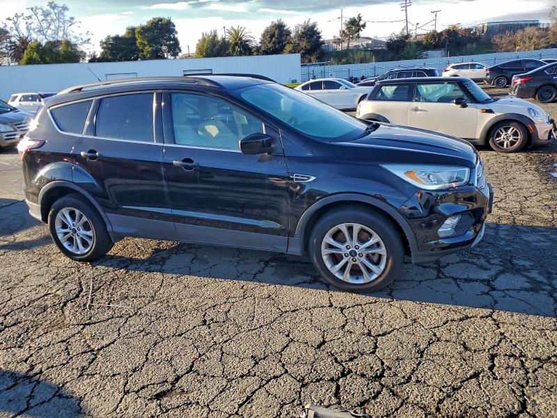 Photo 4 from auction – 2017 FORD ESCAPE SE with VIN 1FMCU0G92HUB29993