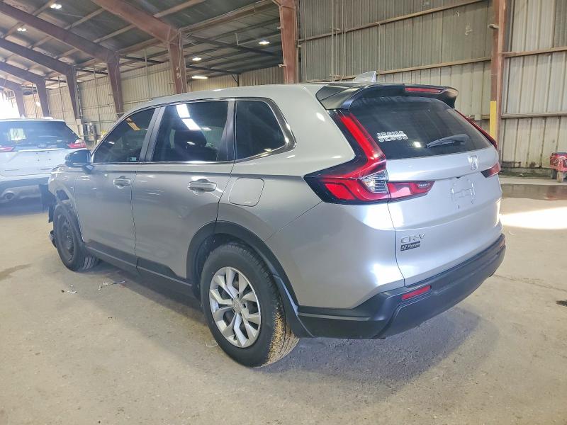 Photo 2 from auction – 2023 HONDA CR-V LX with VIN 2HKRS3H22PH306901