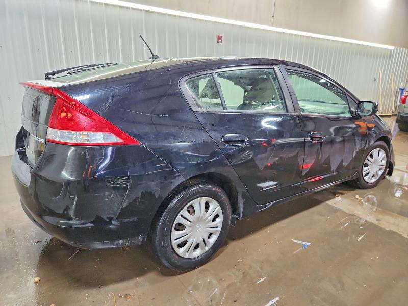 Photo 3 from auction – 2010 HONDA INSIGHT LX with VIN JHMZE2H50AS011864