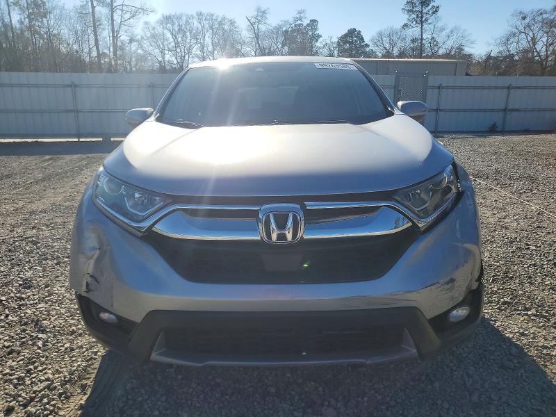 Photo 5 from auction – 2018 HONDA CR-V with VIN 7FARW1H89JE000575