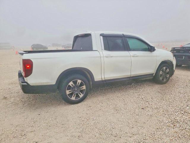 Photo 3 from auction – 2017 HONDA RIDGELINE with VIN 5FPYK2F55HB004612