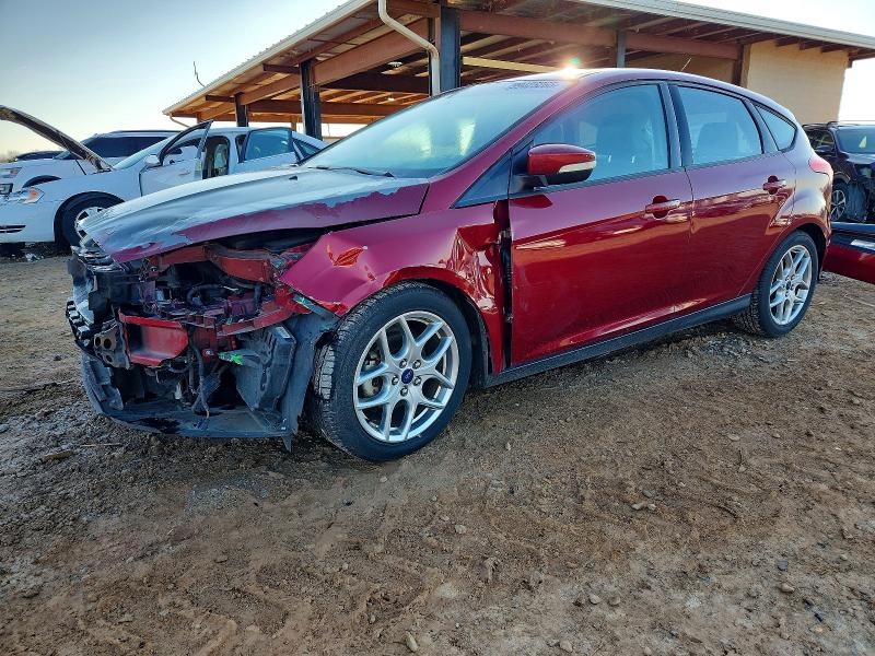 FORD FOCUS SE 2015 with VIN 1FADP3K21FL220385 - Photo from auction