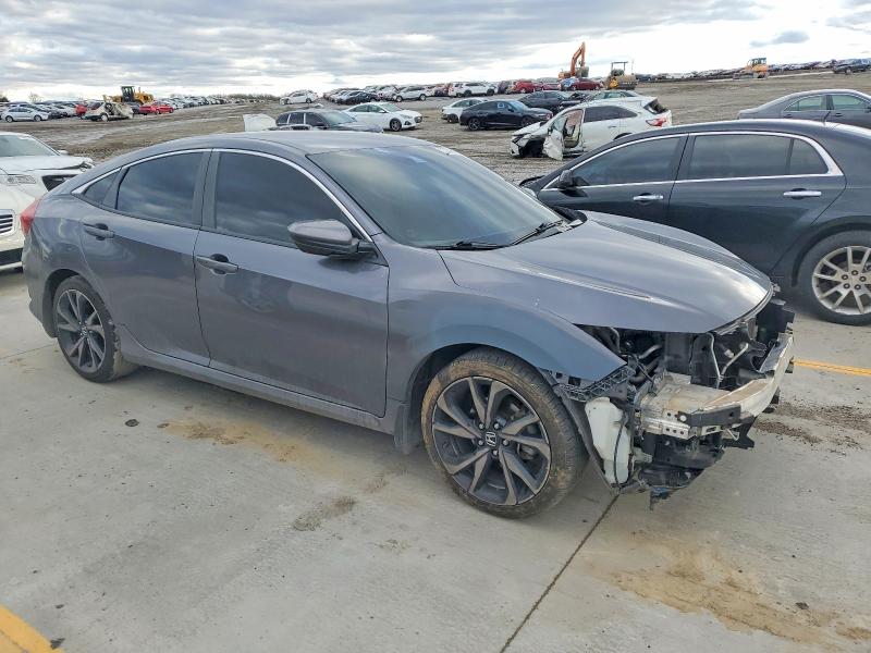 Photo 4 from auction – 2019 HONDA CIVIC SPOR with VIN 2HGFC2F81KH564850