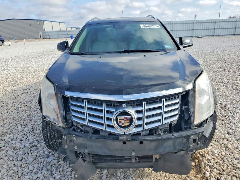 Photo 5 from auction – 2015 CADILLAC SRX with VIN 3GYFNCE33FS619509