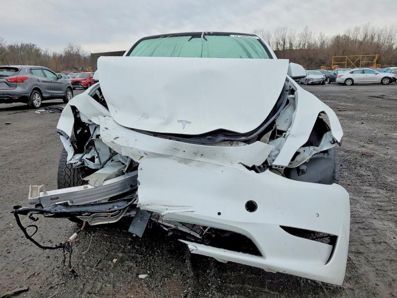 Photo 5 from auction – 2022 TESLA MODEL Y with VIN 7SAYGDEE5NF436347
