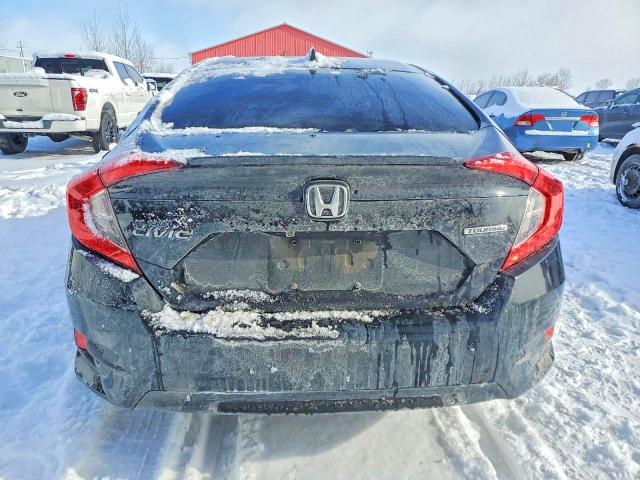 Photo 6 from auction – 2016 HONDA CIVIC TOUR with VIN 2HGFC1F99GH112803