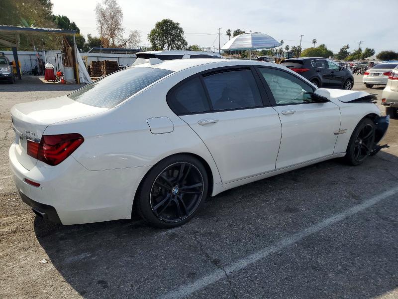 Photo 3 from auction – 2015 BMW 740 with VIN WBAYA6C50FGK16485