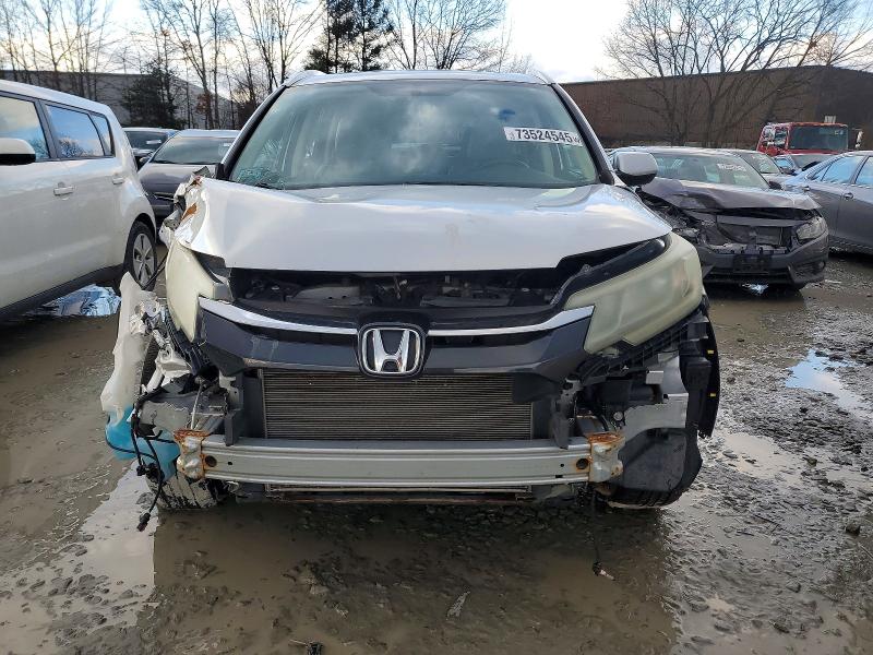 Photo 5 from auction – 2015 HONDA CR-V EXL with VIN 2HKRM4H71FH608934