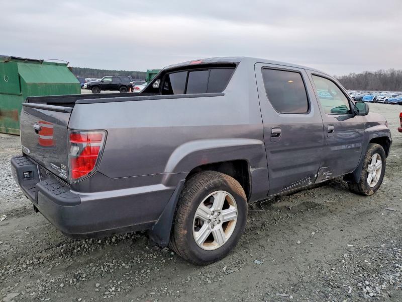 Photo 3 from auction – 2014 HONDA RIDGELINE with VIN 5FPYK1F55EB002994