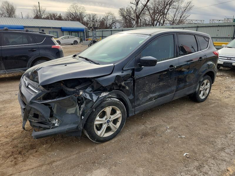 FORD ESCAPE 2014 with VIN 1FMCU0GX4EUE37774 - Photo from auction