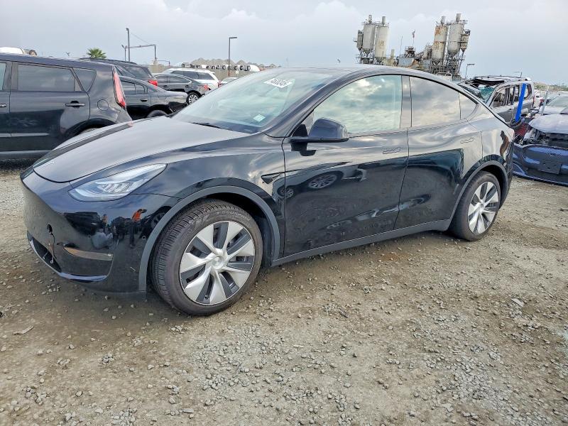 TESLA MODEL Y 2022 with VIN 7SAYGAEE4NF365737 - Photo from auction