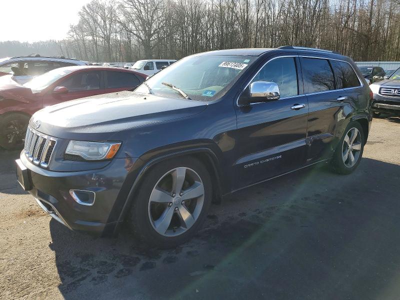JEEP GRAND CHER 2014 with VIN 1C4RJFCG7EC255380 - Photo from auction