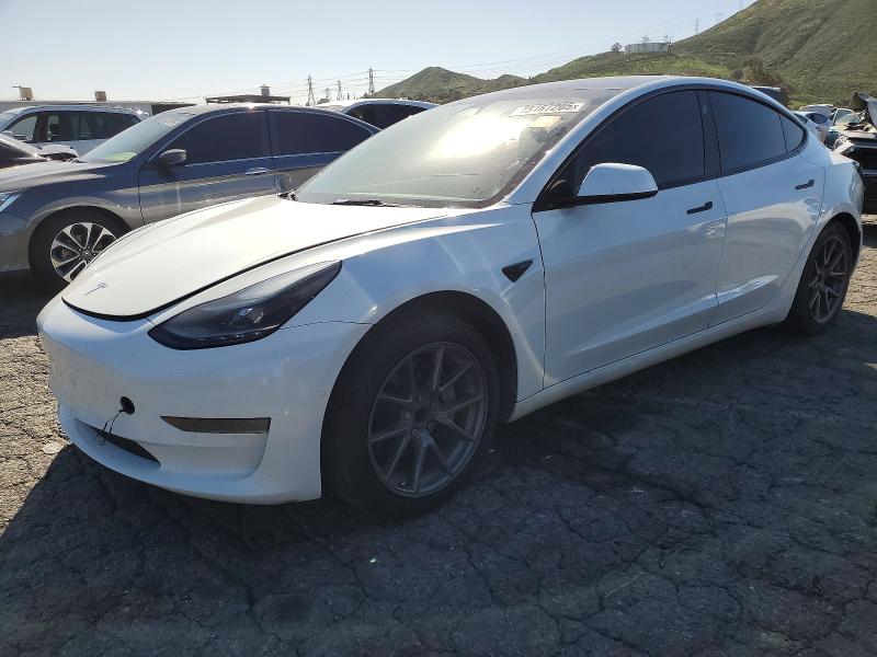 TESLA MODEL 3 2022 with VIN 5YJ3E1EAXNF156979 - Photo from auction