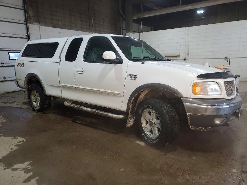 Photo 4 from auction – 2002 FORD F150 with VIN 2FTRX18L52CA77109