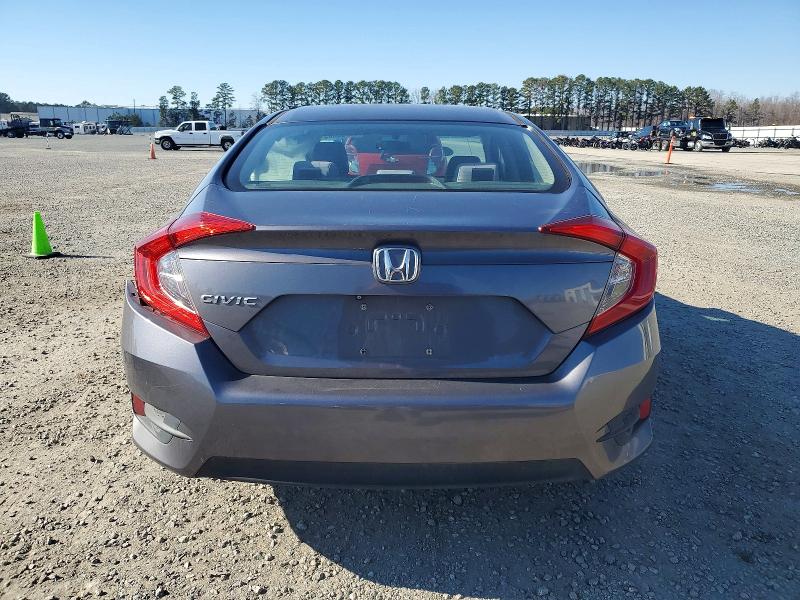 Photo 6 from auction – 2017 HONDA CIVIC LX with VIN 2HGFC2F54HH521490