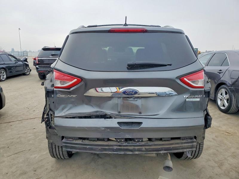 Photo 6 from auction – 2016 FORD ESCAPE with VIN 1FMCU0J92GUC60297