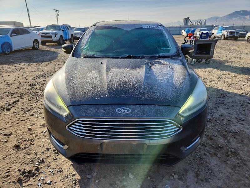 Photo 5 from auction – 2016 FORD FOCUS TITA with VIN 1FADP3N26GL405299