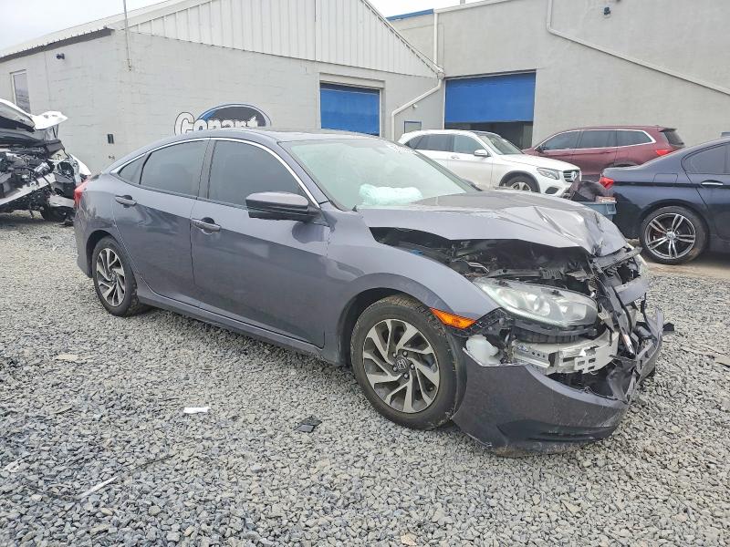 Photo 4 from auction – 2018 HONDA CIVIC with VIN 2HGFC2F72JH609154