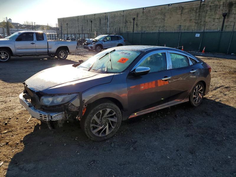 HONDA CIVIC EX 2018 with VIN 2HGFC2F72JH574020 - Photo from auction