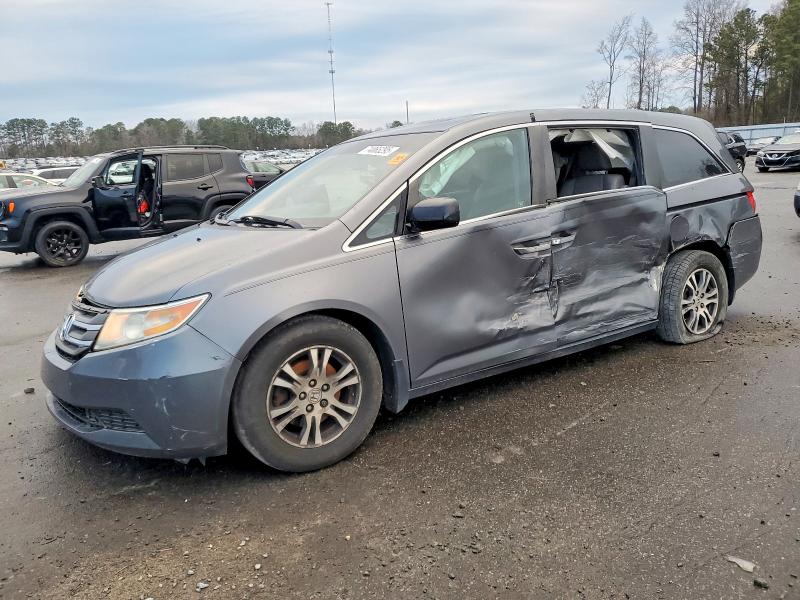 HONDA ODYSSEY 2011 with VIN 5FNRL5H64BB096319 - Photo from auction