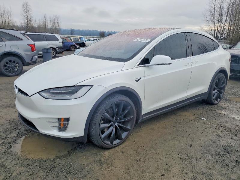 TESLA MODEL X 2020 with VIN 5YJXCBE21LF249506 - Photo from auction