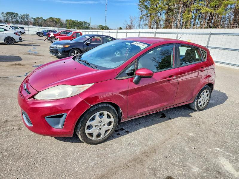 FORD FIESTA SE 2011 with VIN 3FADP4EJ9BM212066 - Photo from auction