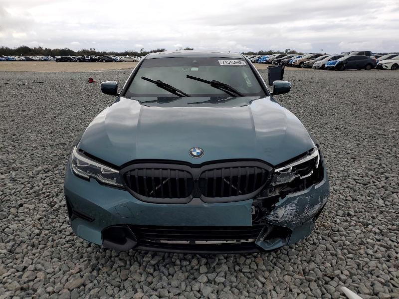 Photo 5 from auction – 2021 BMW 330I with VIN 3MW5R1J03M8B84178