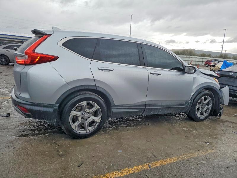 Photo 3 from auction – 2017 HONDA CR-V with VIN 7FARW1H8XHE029917