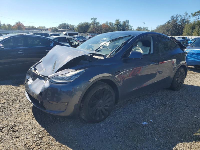 TESLA MODEL Y 2022 with VIN 7SAYGDEE0NF414479 - Photo from auction