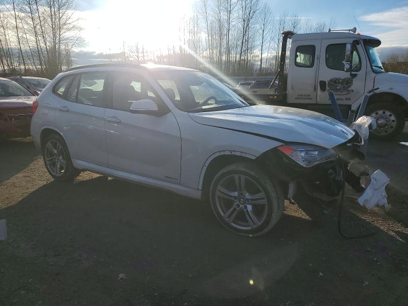 Photo 4 from auction – 2015 BMW X1 XDRIVE2 with VIN WBAVL1C53FVY38560